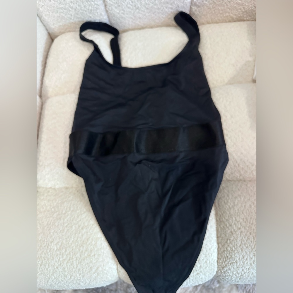 Black thong one piece swimsuit